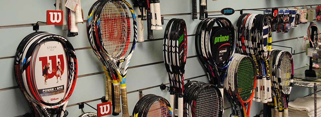 Pro shop with racquets on the wall